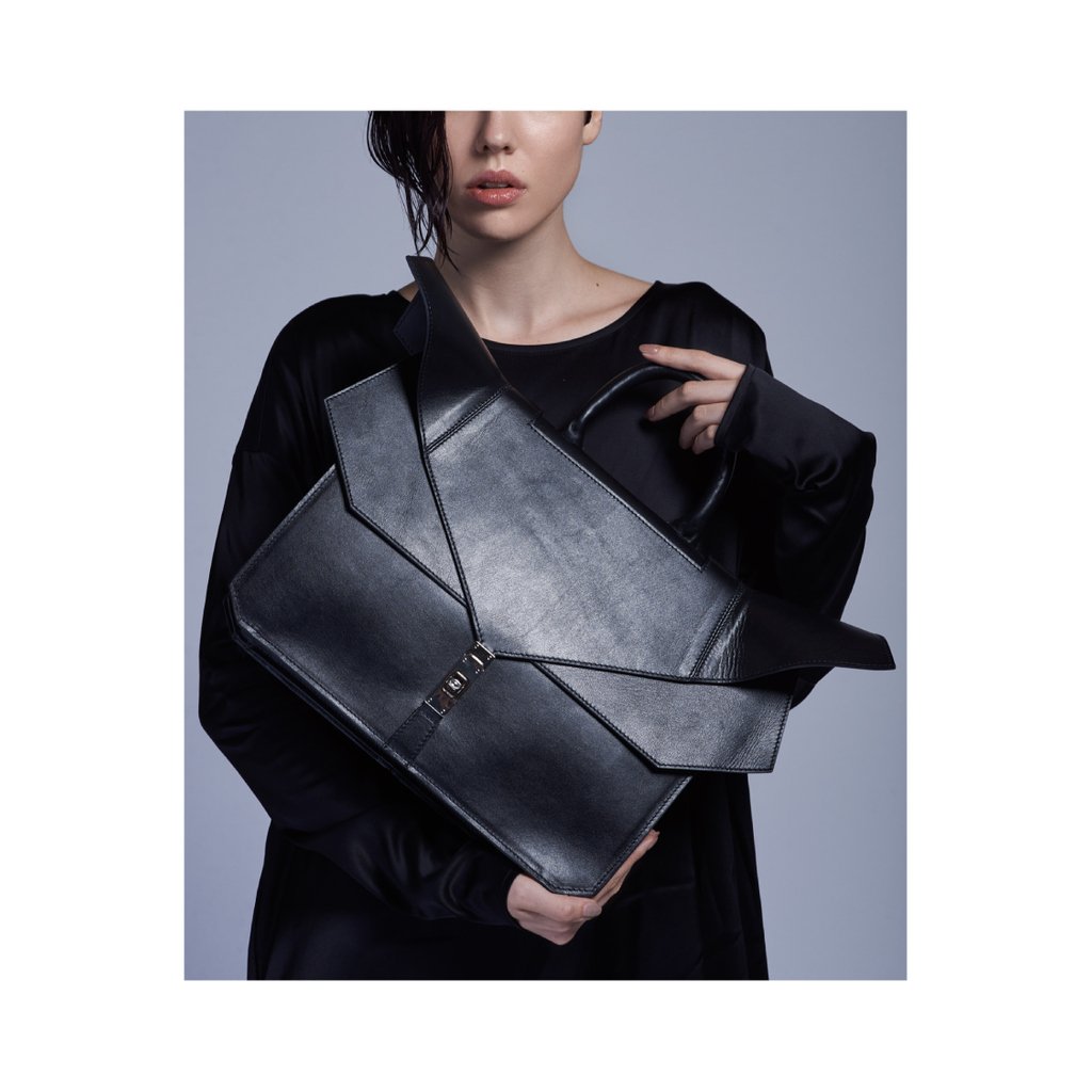 Dramatic. @thechangingfactor bags now on sale. Very Limited quantities. Visit thechangingfactor.com to shop.