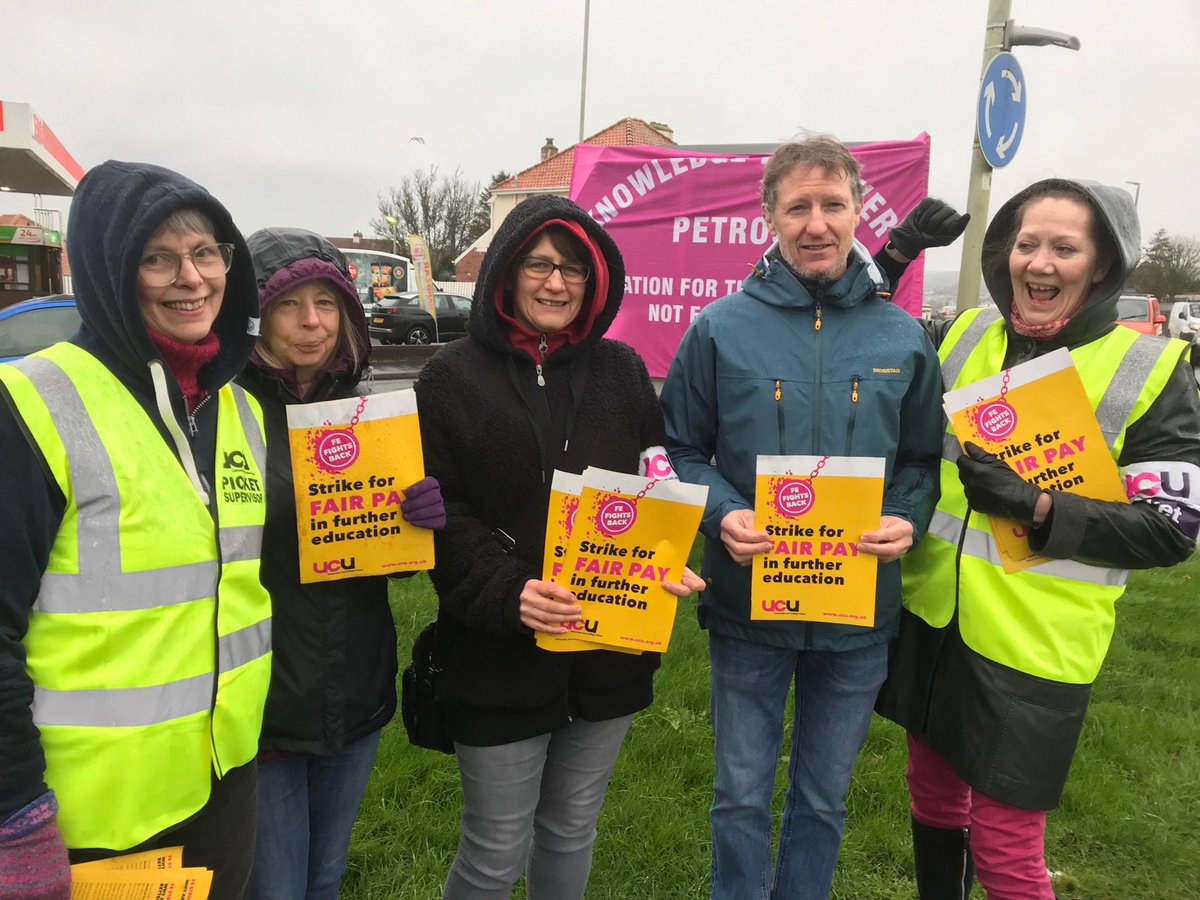 UCUSOUTHWEST's tweet image. PETROC pickets smiling in the rain