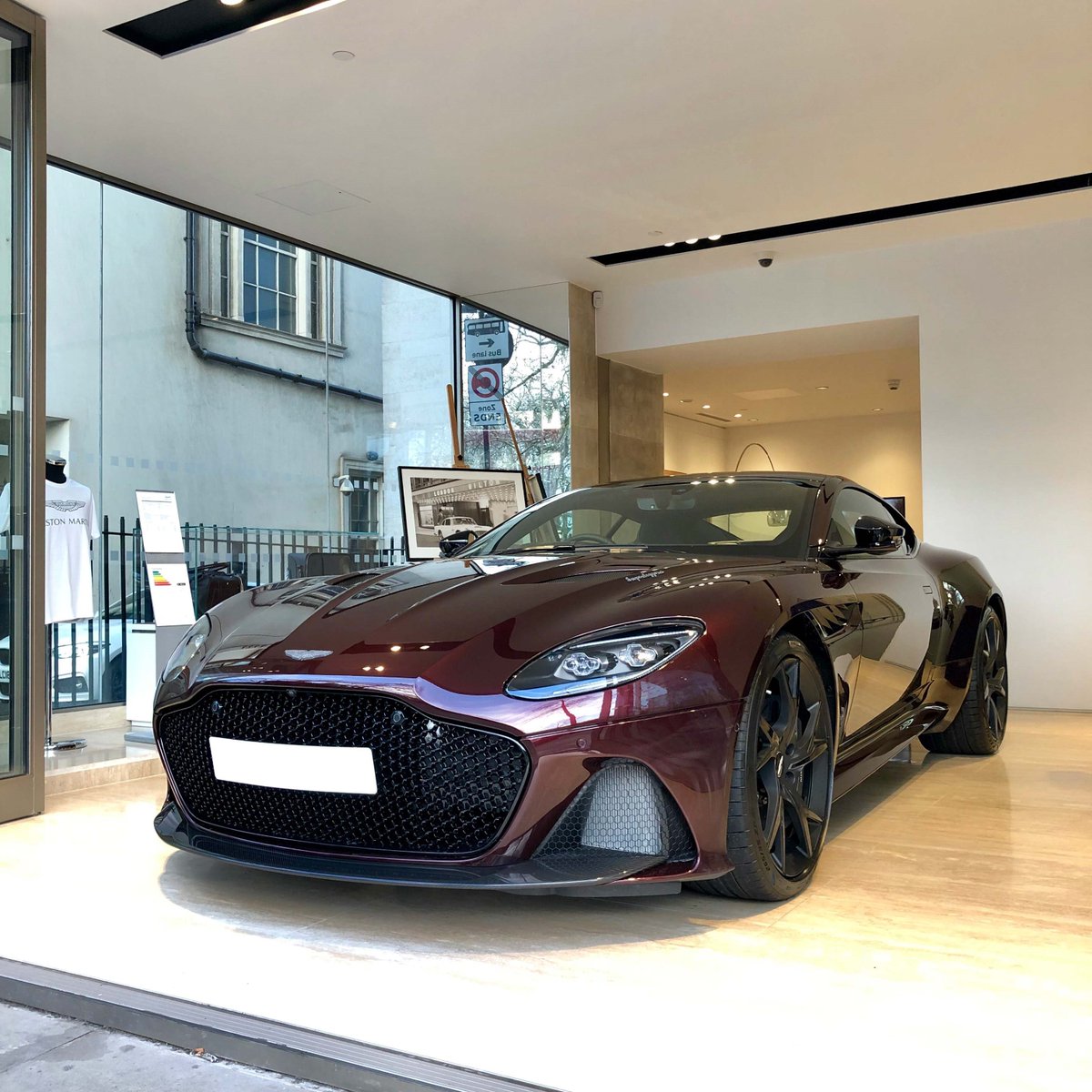 AstonMartinLDN's tweet photo. Divine seems a fitting name for the colour applied to this incredible Aston Martin DBS Superleggera #AstonMartin #DBS #Superleggera #DivineRed https://t.co/Wlmm9DOo5r