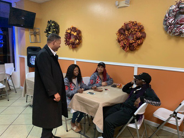 It isn't too early to start shaking hands and hitting the pavement! Check out some pictures from a chilly Monday night on S. Decatur Street!