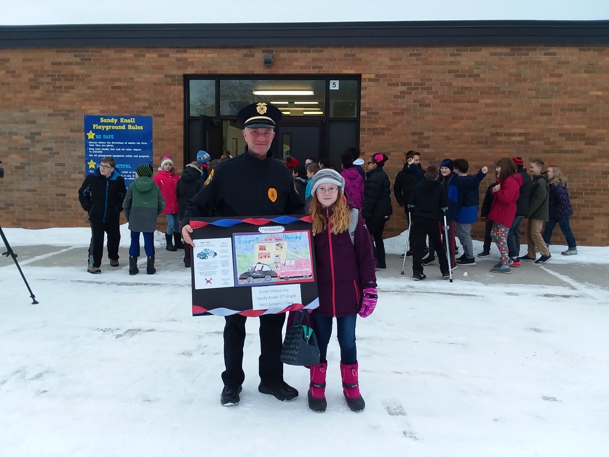 The Marquette City Police want to congratulate Esme Villand-Joy, a fifth grade student at Sandy Knoll Elementary school. She was the winner of the Marquette County Police &amp; Fireman's Ball 2019 poster contest. 
She received a ride to school in a Police car with Chief Rieboldt.