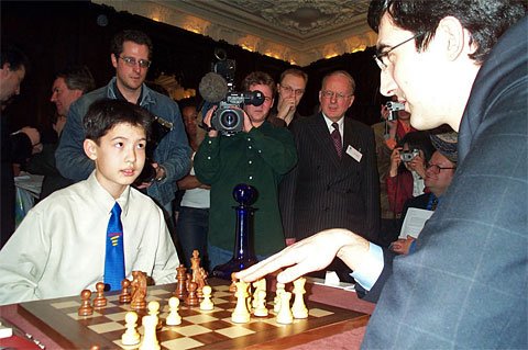 DavidHowellGM's tweet photo. Very sad to hear about the retirement of Vladimir Kramnik. It was an honour to play him several times, including as an 11-year-old (see below). He also taught me a lesson at last year's Olympiad. A true gentleman and one of my favourite players. #legendofchess https://t.co/EzWalUSbHU