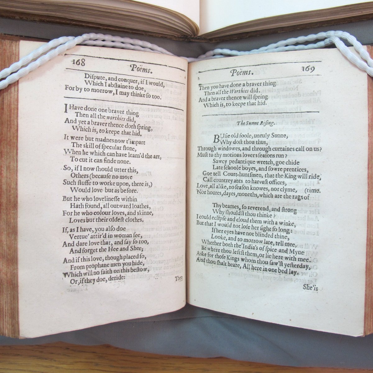theULSpecColl's tweet photo. Together in the #readingroom: The first edition of John Donne's collected poems (1633) and the stunningly calligraphed Leconfield manuscript (ca 1620-1632). All this beauty and a bonus discovery for #temoinTuesday! https://t.co/ENzm14IPW1