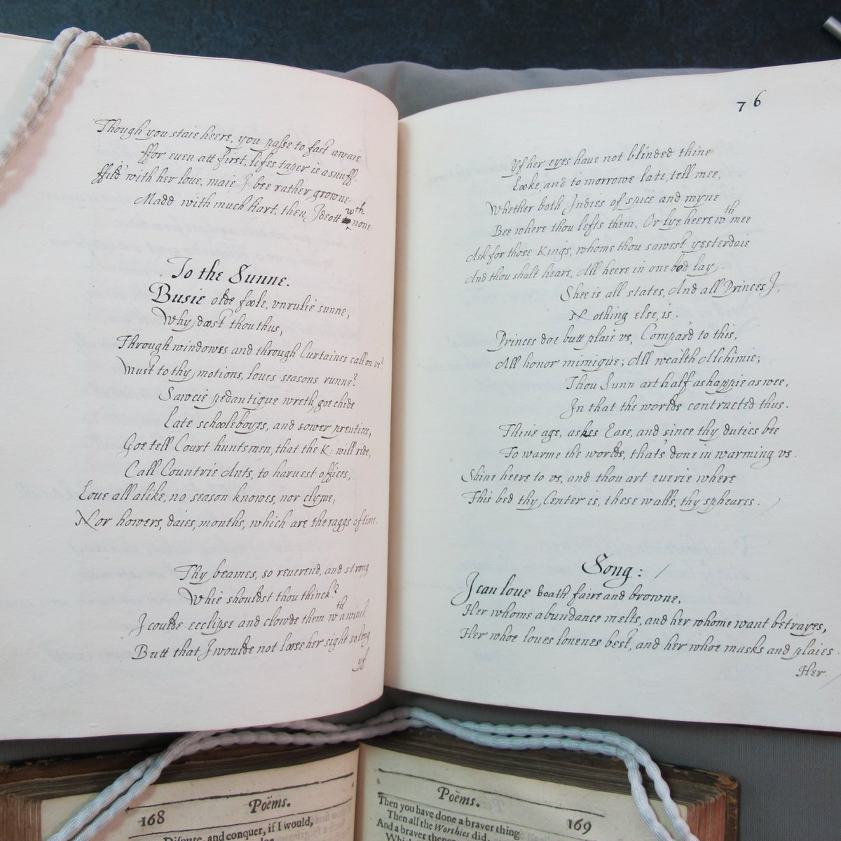 theULSpecColl's tweet photo. Together in the #readingroom: The first edition of John Donne's collected poems (1633) and the stunningly calligraphed Leconfield manuscript (ca 1620-1632). All this beauty and a bonus discovery for #temoinTuesday! https://t.co/ENzm14IPW1