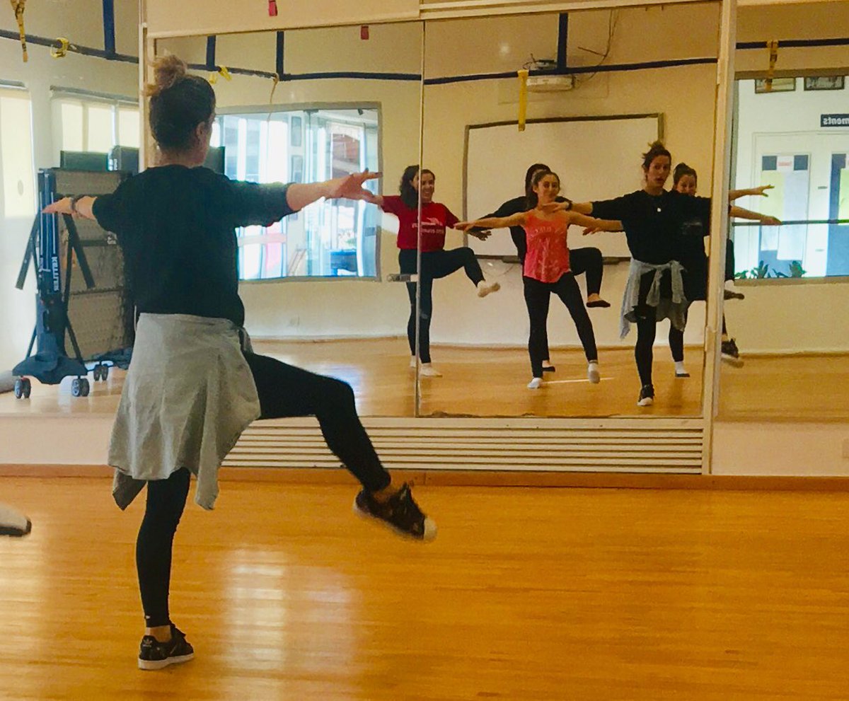 High school dance team warms up at start of practice. #wbais