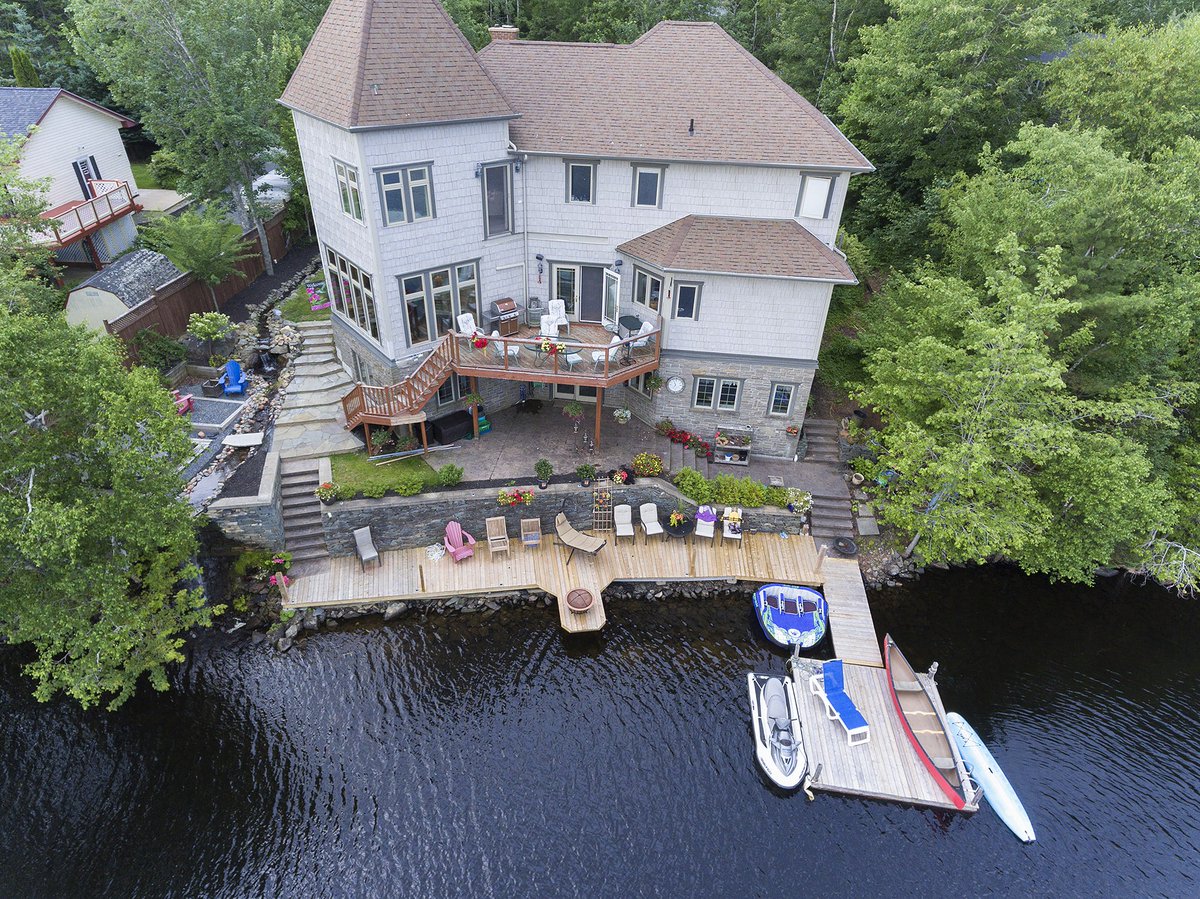 NasKlayme's tweet photo. 81 Saskatoon- This large, breathtaking sunken lot is on a quiet street, has a private backyard with natural stone walkways, large driveway, fully landscaped, 80 ft water stream &amp; 4 waterfalls along newly constructed 8' x 80' boardwalk across 100' lakefront https://t.co/jE44xCebS8 https://t.co/nVR3BGdlth