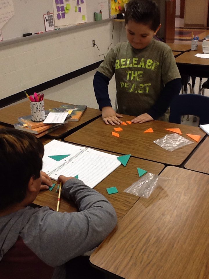 seabeesgifted's tweet photo. Third graders use tangrams to create polygons. To stretch theirs brains, each tangram piece is assigned a numeric value, so each polygon created must be a certain total. https://t.co/yB9tWPvVSc