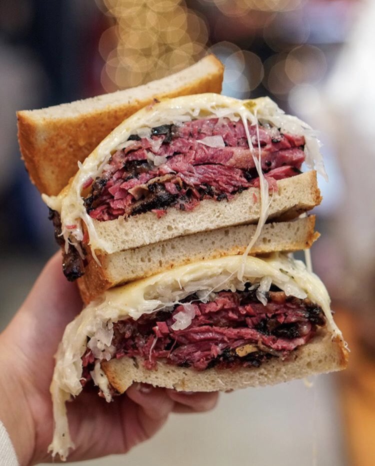 Look at this amazing pastrami Reuben made specially at A Taste Of Katz’s in Brooklyn! Thanks <a href="/befatbehappy/">Caitlin Sak</a> for the awesome picture! @dekalbmarkethall ❤️😋 #snowday