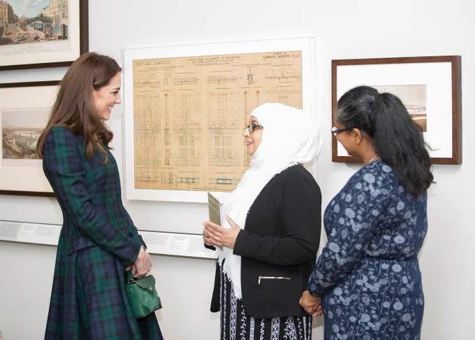 The Duchess of Cambridge in our Scottish Design Galleries in front of an architectural diagram speaking with two people from Amina Muslim Women Resource Centre.