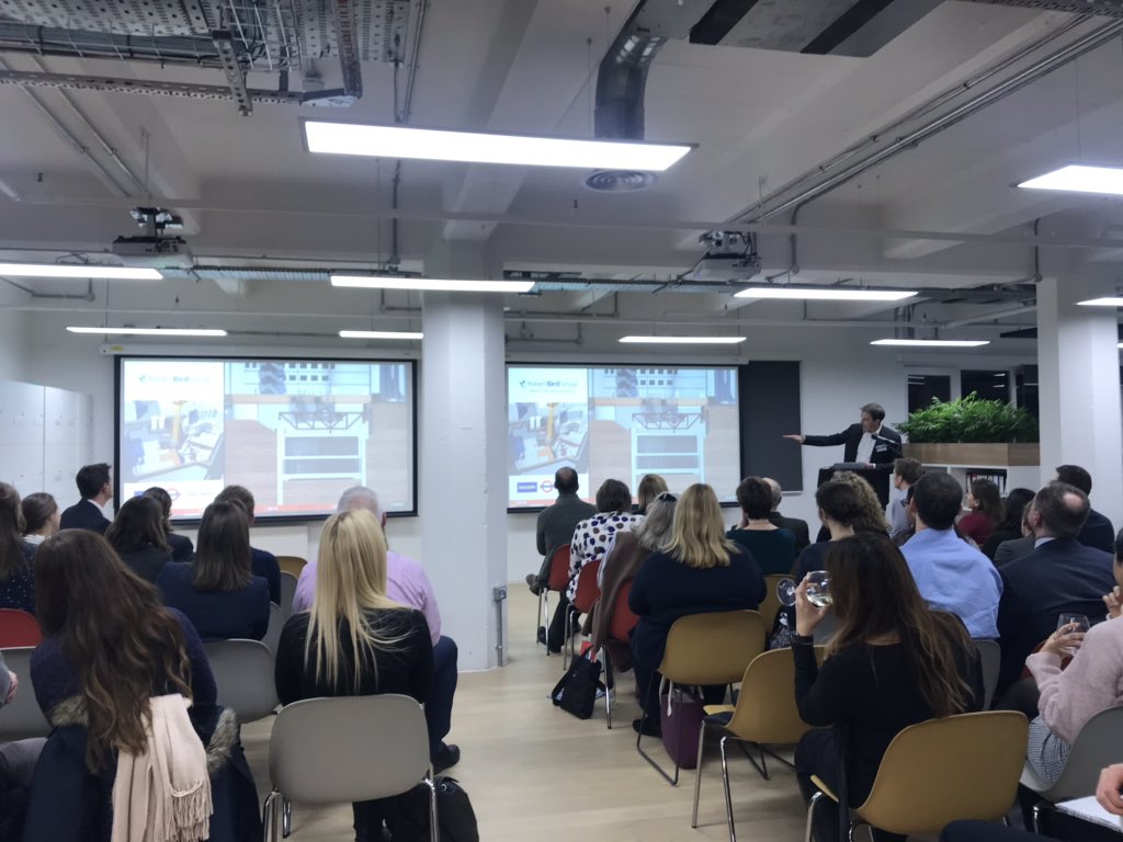transportwm's tweet photo. Phil Hallinan #RobertBirdGroup illustrates how the New Cannon Street entrance hall will be built with an animation showing their innovative method suspending 4 levels of top-down type basement slabs from a steel truss #networking #womenintransport #raildevelopment https://t.co/w3br1YIlOf