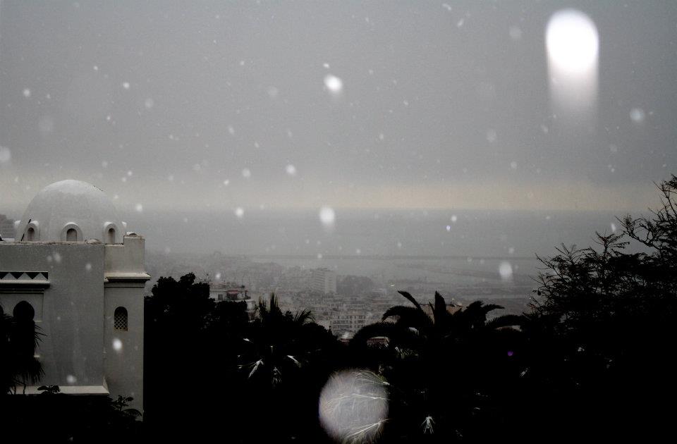 We touched down on my rooftop - this is the view from my house, looking out over the bay (one day sunny, next day: FREAK SNOWSTORM). Ta7ya Djazair!