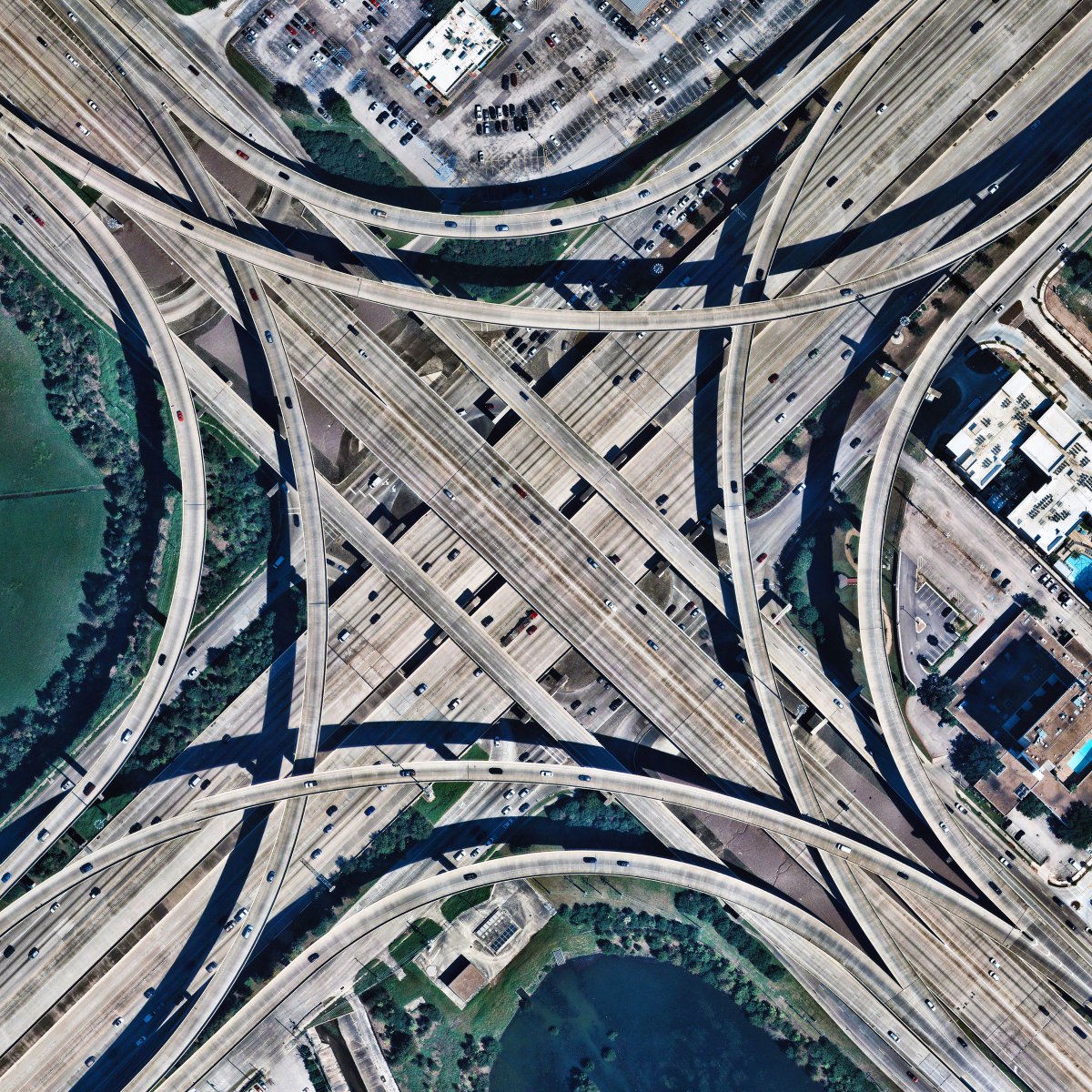 A stack interchange forms at the intersection of Beltway 8 and Interstate 10 in Memorial City, Texas. See more here: bit.ly/2Ut4sbk /// #dailyoverview #aerialphotography #picoftheday #earth #stackinterchange #MemorialCity #Houston #Texas #urban #traffic
