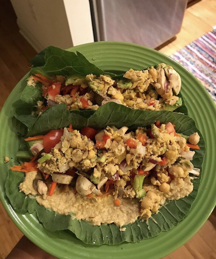 Raw Vegan Wraps with chickpea salad, tomatoes, hummus, mushrooms 