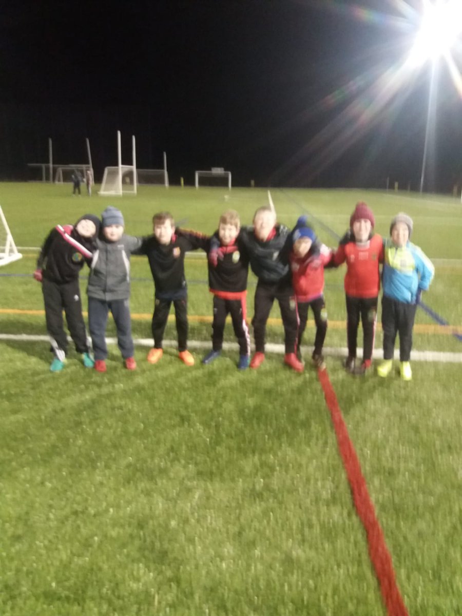 AntrimGamesDev's tweet photo. Some of the @aldergrovegaa U10 showing the wind, rain and sleet doesn't stop them having great Craic at training.  Thanks to Declan and co 😁 training every Tuesday 630pm to 730pm crumlin leisure centre 3g https://t.co/ZoKk62oQoQ
