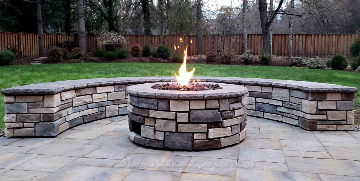 LewisLandscapes's tweet photo. Here are some pics from a project we completed. Here we installed a paver patio, outdoor kitchen, and stone fireplace &amp; seat wall. https://t.co/gnrpI6iw6O