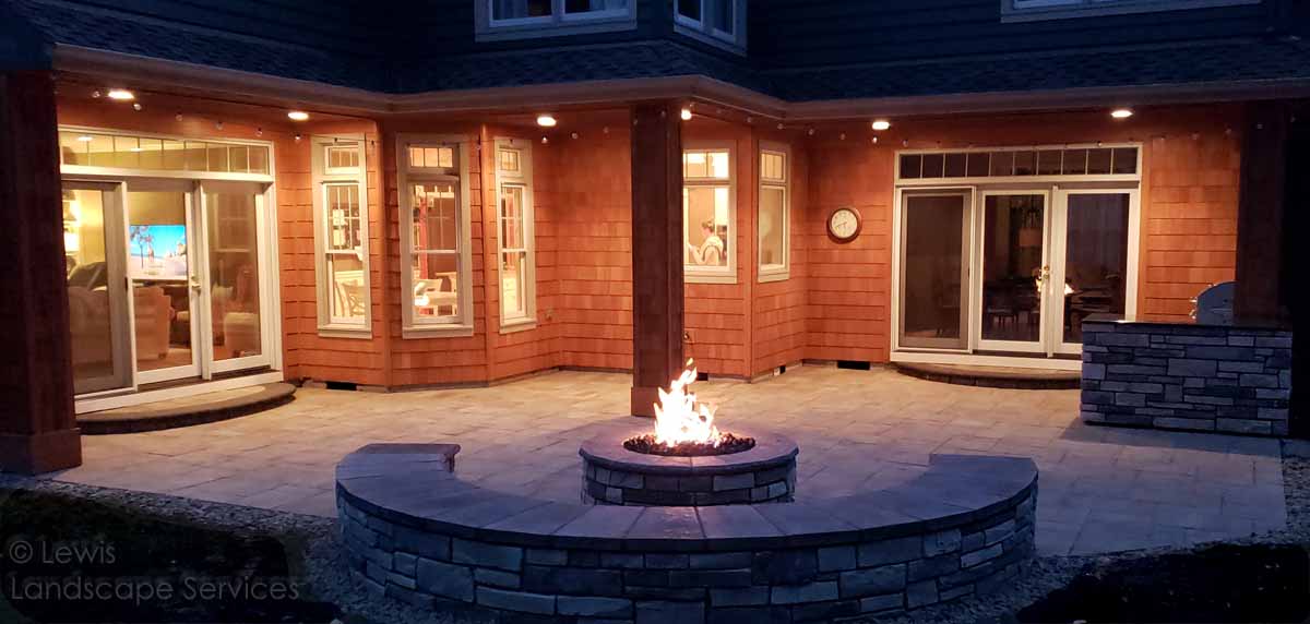 LewisLandscapes's tweet photo. Here are some pics from a project we completed. Here we installed a paver patio, outdoor kitchen, and stone fireplace &amp; seat wall. https://t.co/gnrpI6iw6O