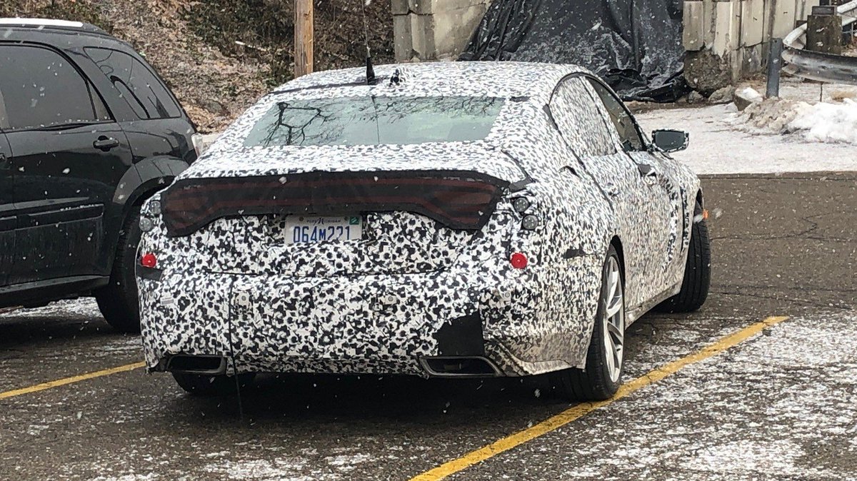 Jalopnik's tweet photo. Why is there a fake Dodge Charger taillight on this Cadillac CT5 prototype https://t.co/N2FTnO7bZZ https://t.co/nSjQHh4G7J
