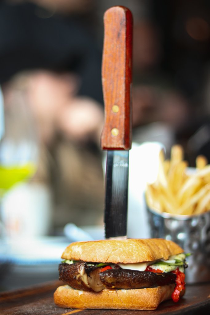 Presenting our new Veggie Focaccia Sandwich to fulfill all your meatless sammy dreams! Portobello mushroom with roasted peppers, caramelized onions, fresh spinach and arugula, topped with pecan goat cheese, aioli and pesto!