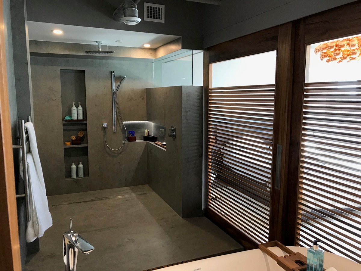 One of the best parts about using Sintered Stone from <a href="/Neolith_/">Neolith (❖,❖)</a> is its versatility: these incredibly high-tech surfaces can be used anywhere in or out of your home, including for shower cladding! These homeowners used Beton to build their dream shower. Say goodbye to grout lines!