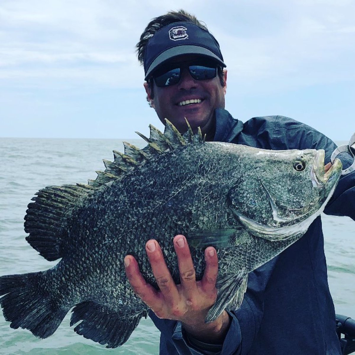 CastNets's tweet image. Captain Ryan Bell showing off his triple tail. #castnets #fishinglife