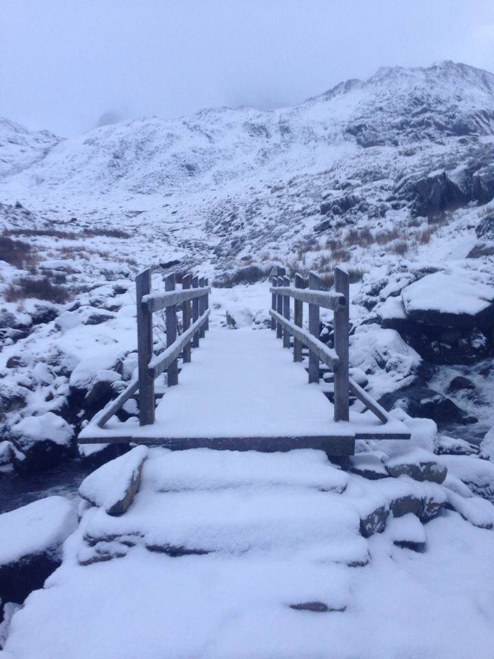 NTCymru_'s tweet photo. A beautiful snowy morning at Cwm Idwal today ❄️  
With more snow and ice forecast overnight, some of our places will be closed tomorrow. Don’t forget to check the website before travelling. Stay safe out there! https://t.co/hfoE7lAPkr