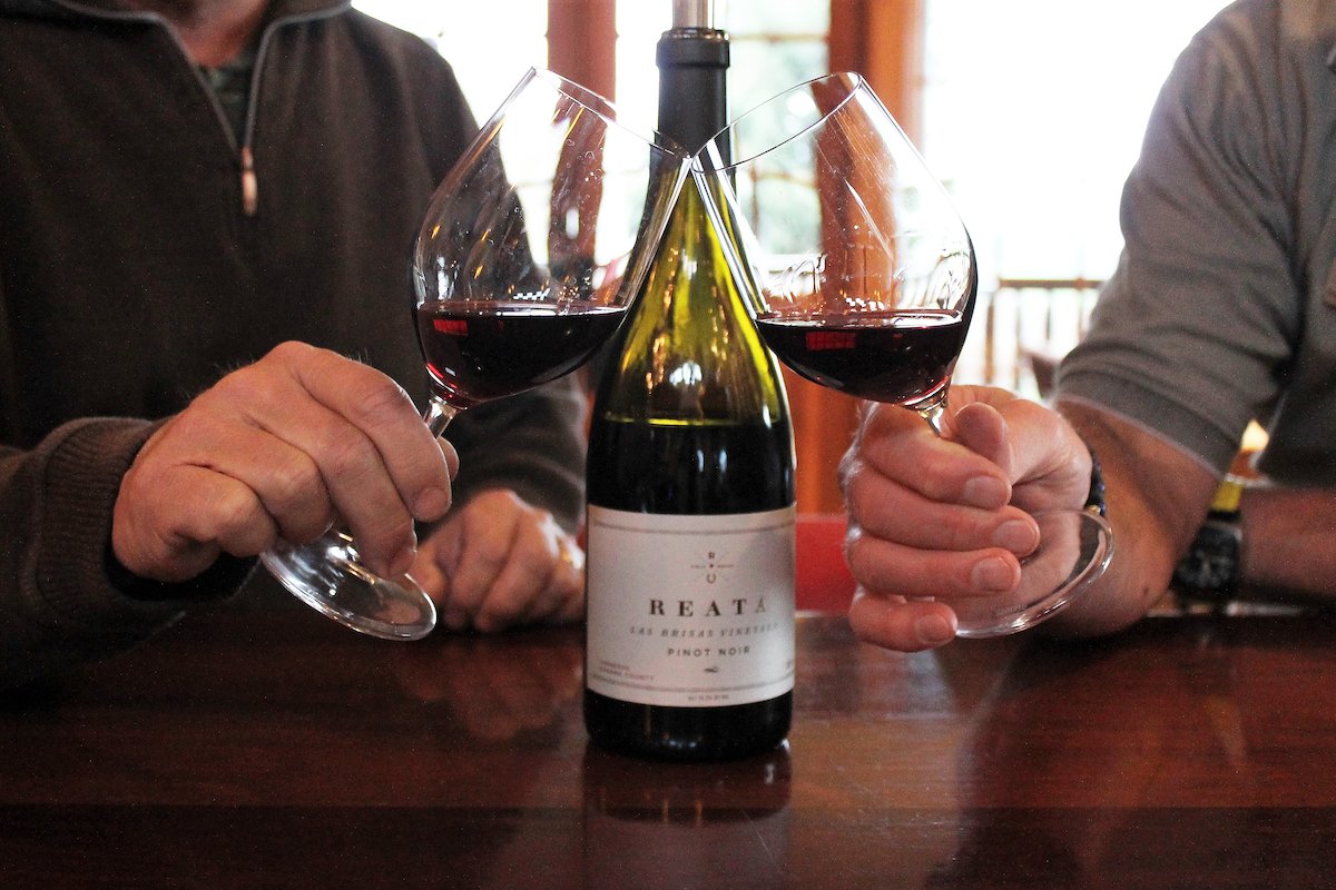 Serving happiness by the glass. 🍷 Our '15 Reata Las Brisas Vineyard Pinot Noir is made from a single vineyard in the windswept hills of Sonoma’s Carneros, a cool coastal appellation where the Pinot Noir grape reaches its fullest expression. 

#napavalley #pinotnoir #winetasting