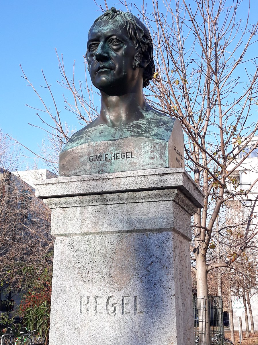 22\\ Statue of Georg Wilhelm Friedrich Hegel at the Hegel Square at Berlin’s Humboldt University, where he was professor from 1818 until 1831. The sketch shows him with students in Berlin.