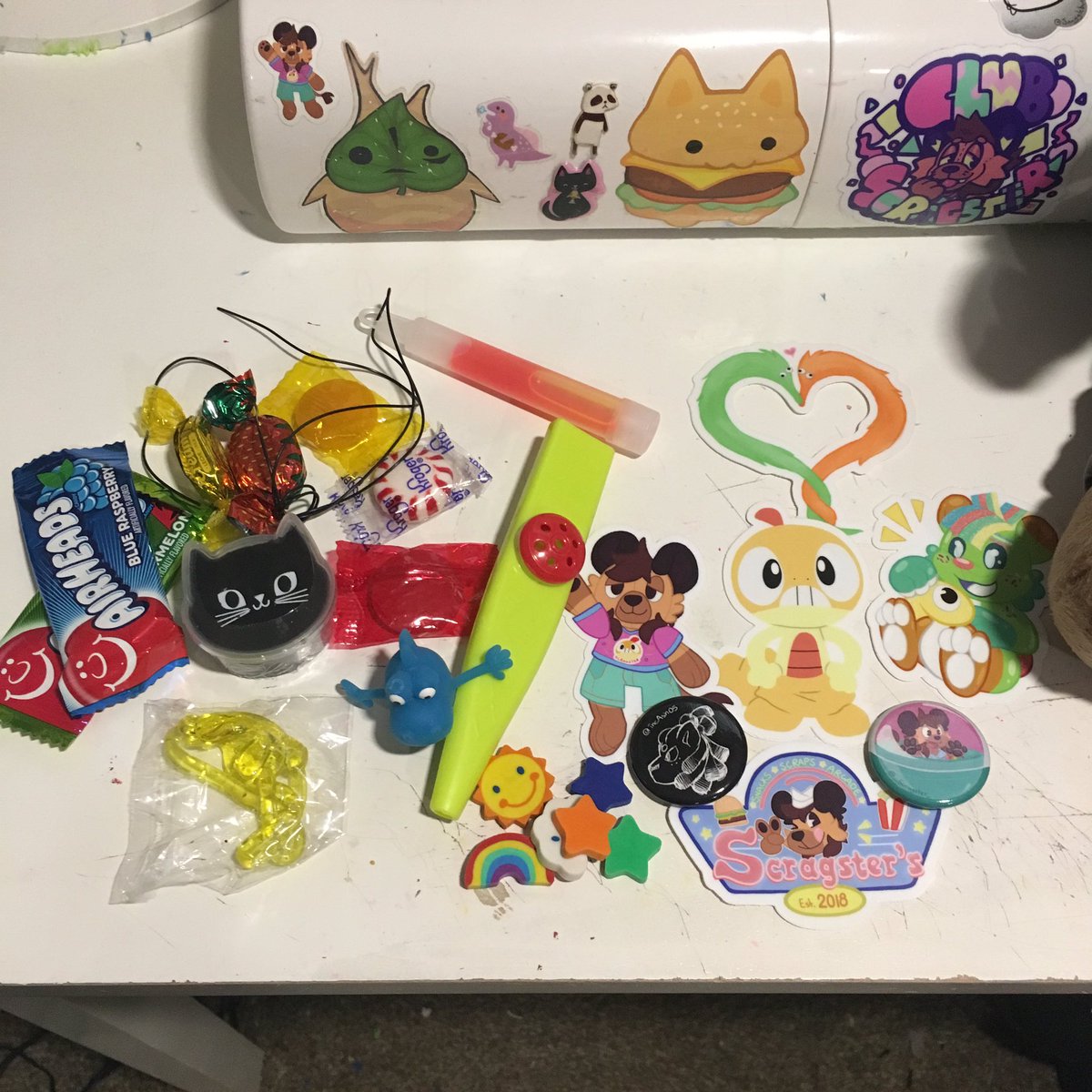 _scragster_'s tweet photo. Enter for a chance to win a goodie bag! I send these out with plush commissions and these are the last of some of these goodies so!!! Giveaway time!! 

🎟Follow and RT to enter!

🍭No giveaway accounts!

🦖Ends February 12th! https://t.co/5IXRoQ0tzM