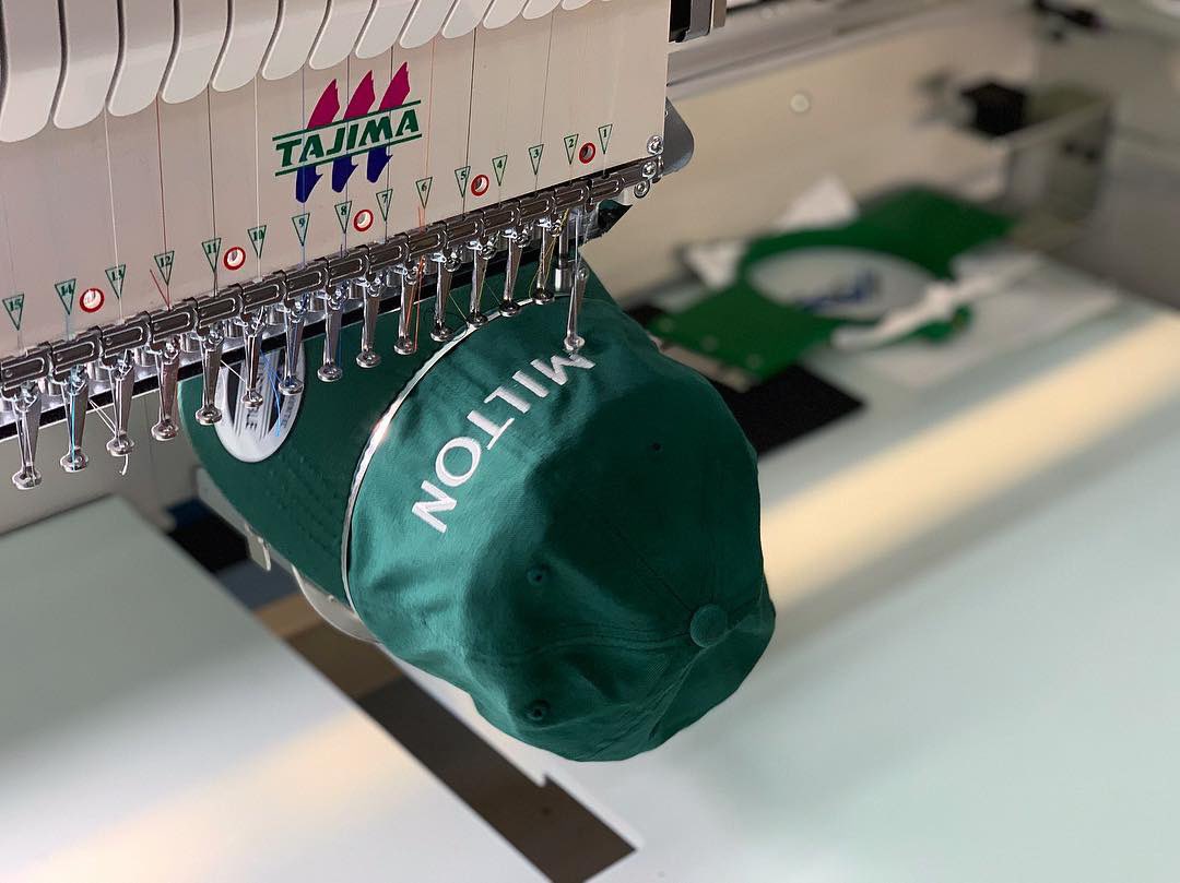 printeez's tweet photo. Embroidery machine running some beautiful dad hats. https://t.co/CLwaxX0ZBe