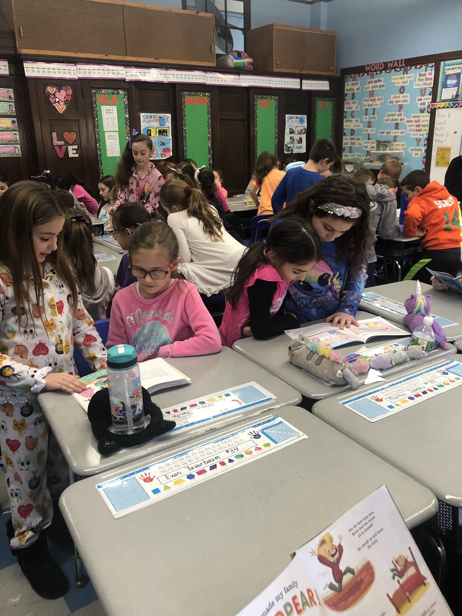 SCSMsMueller's tweet photo. 4th grade reading their favorite book to the 2nd graders on Comfy Cozy Day 📚 #CatholicSchoolsWeek https://t.co/EwEhYZ7mBW