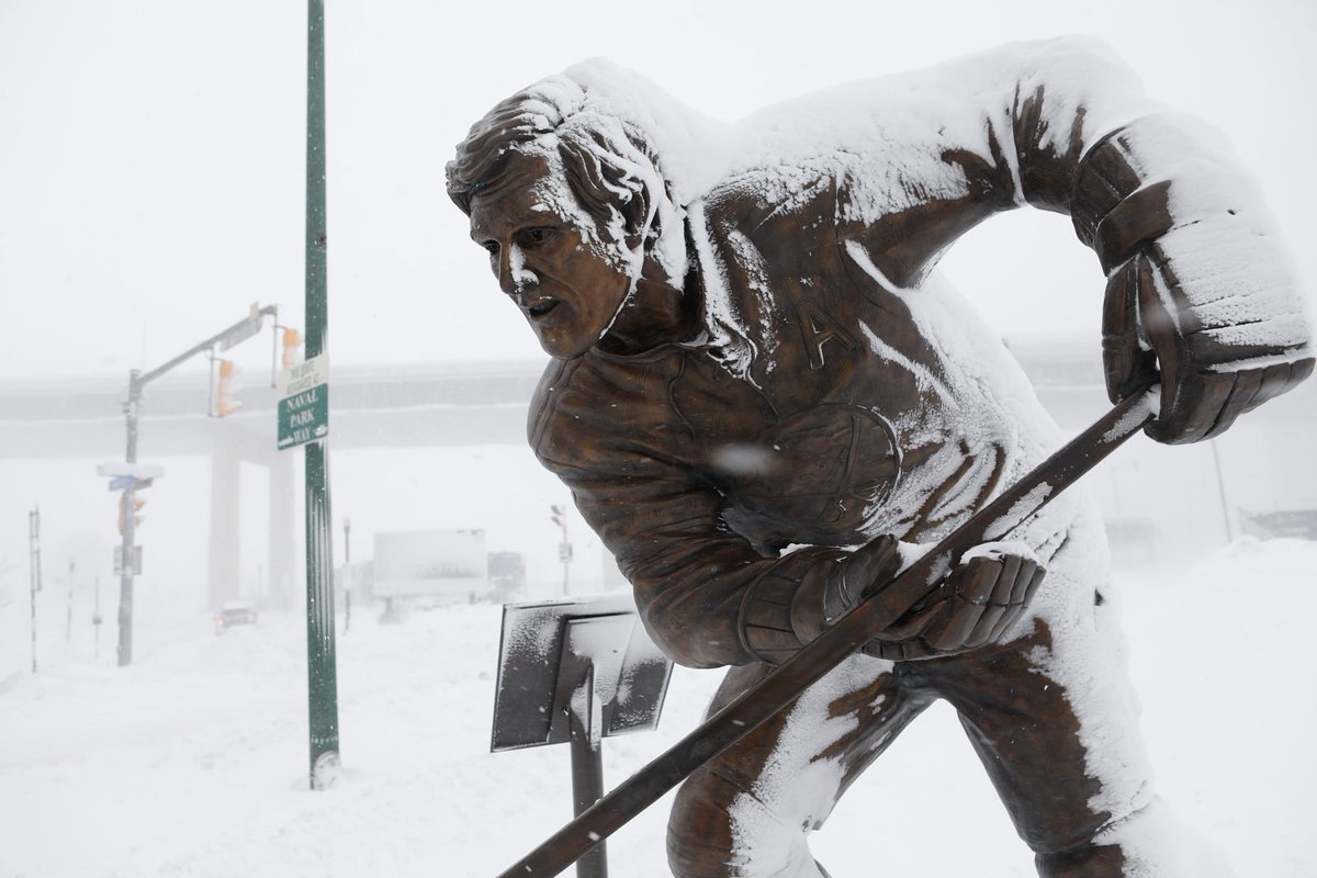 DerekGeePhoto's tweet photo. Is it just me, or does it seem like this statue of Tim Horton at @CanalsideBflo appears to be shoveling snow this morning? #Blizzardof2019 https://t.co/hGnKyO6TjJ
