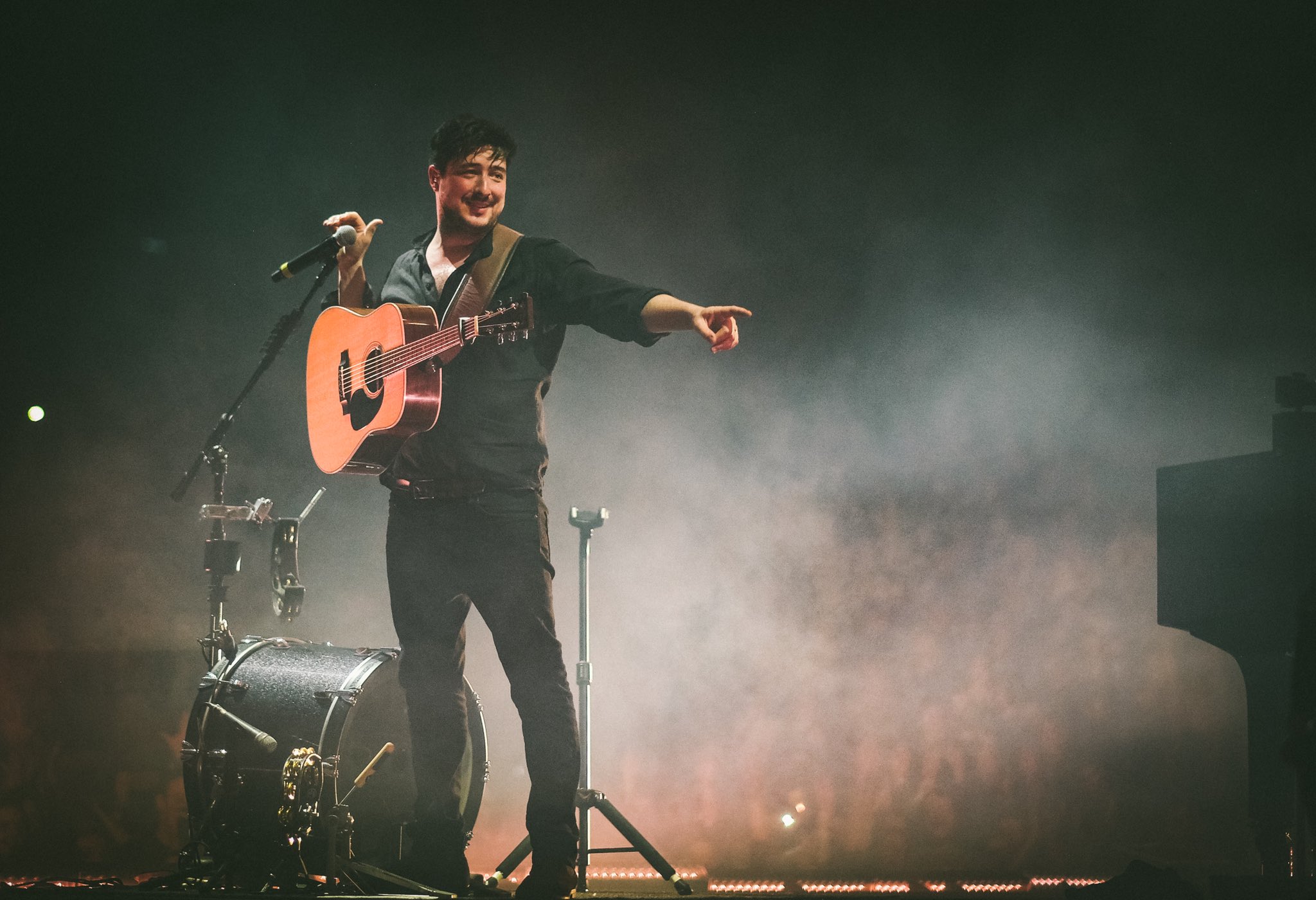 Happy birthday, Marcus Mumford. Here you are pointing at the cake we forgot to buy you 