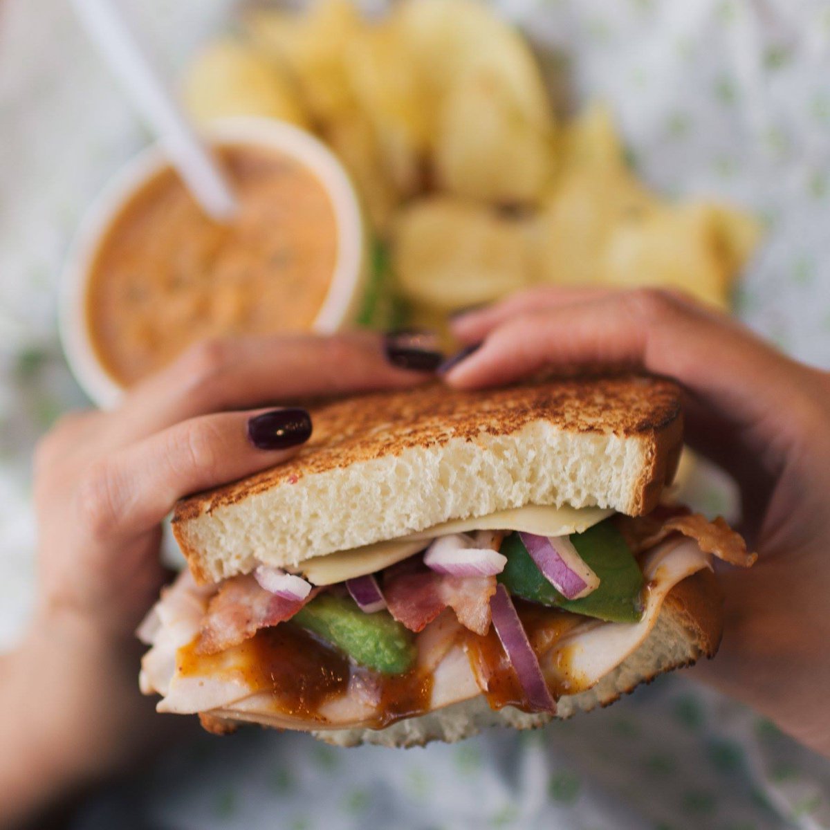 pressdreddeer's tweet photo. Time for lunch! The Southwestern Club sandwich packs in some amazing flavours, made with Turkey, Jalapeño Jack, Bacon, Red Onion, Avocado &amp; Raspberry Chipotle Honey Mustard. 

#GetPressd #reddeer #gasolinealley #lunch #hungry #food #southwesternclub https://t.co/kORhQeiEFg