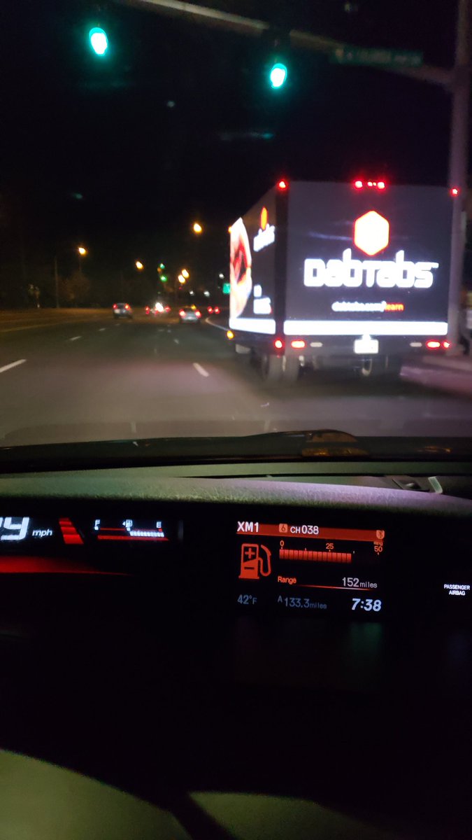 RadicalRuss's tweet photo. I love living in a state where a truck covered top-to-bottom, front-to-back in digital ads for cannabis concentrates is rolling down the street at 5am. Smells like victory! https://t.co/tEdlRS1FGA