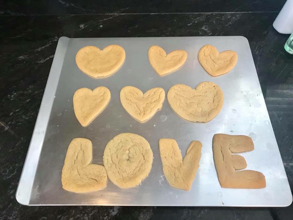 SLCSpearson's tweet photo. These #pearsonpioneers accepted the #colddaycooking challenge and made some Valentine cookies I love the apron and chef hat ❤️!#polarvortex19 https://t.co/THu6vcDKSz