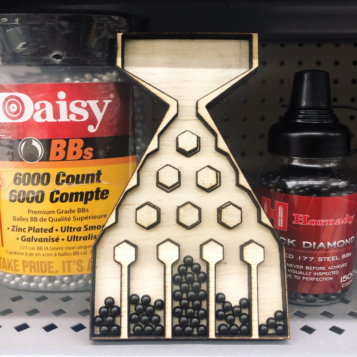vijisathy's tweet photo. It works! I spent the am wrestling with @Illustrator & the laser cutter to make this prototype for my first year seminar #TalkingAboutNumbers @UNC_BeAM and yes, for the final touch I’m testing it in the ammo aisle of a local big box store. #TeachingTakingMeToNewPlaces (literally) https://t.co/WmoZl7z5lF