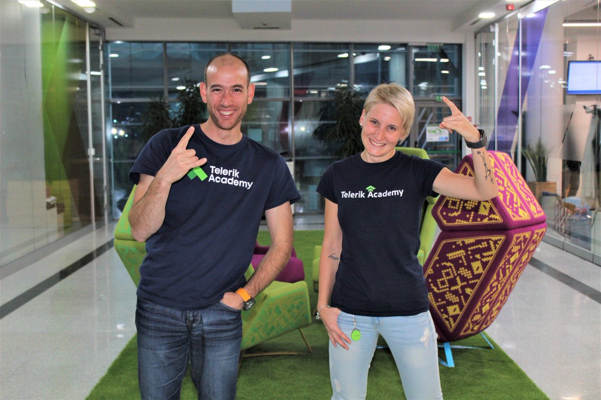 TelerikAcademy's tweet image. Двама от страхотните ни технологични трейнъри с тениски, проследяващи еволюцията на логото ни. 
#fridayfun #telerikacademy #telerikacademyteam