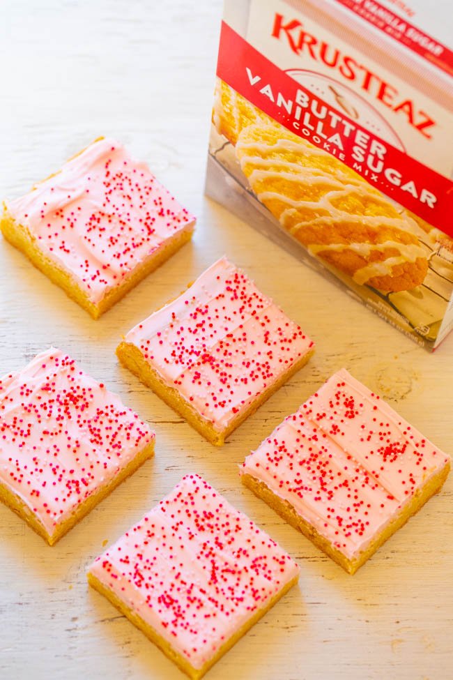 Valentine's Frosted Sugar Cookie Bars - Sugar cookie bars are so much faster &amp; easier than making sugar cookies! Delicious V-Day treat! <a href="/Krusteaz/">Krusteaz</a> #ad averiecooks.com/valentines-fro…