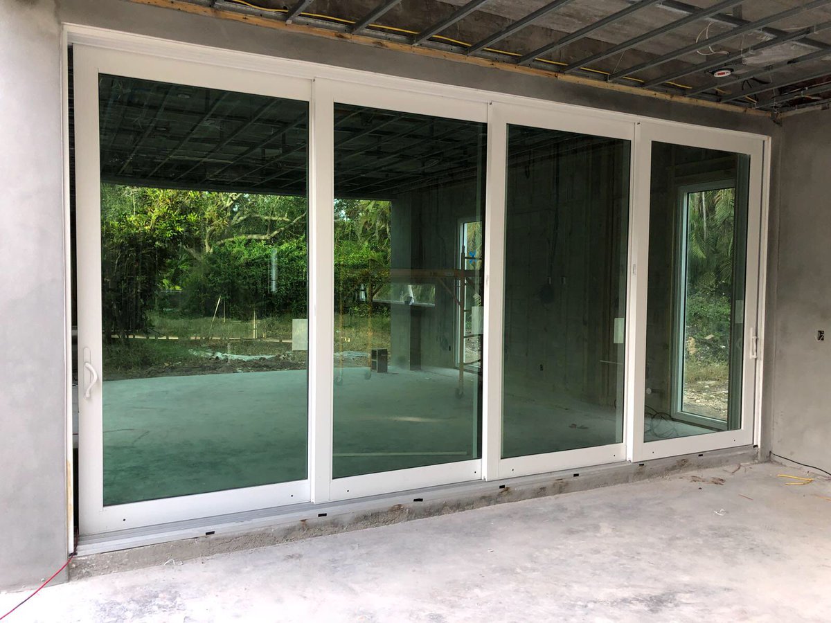 New #construction #singlefamily #home in #Pinecrest | featuring #slidingglassdoors by #PGTIndustries | #impactwindows #impactglass #hurricaneprotection #miami