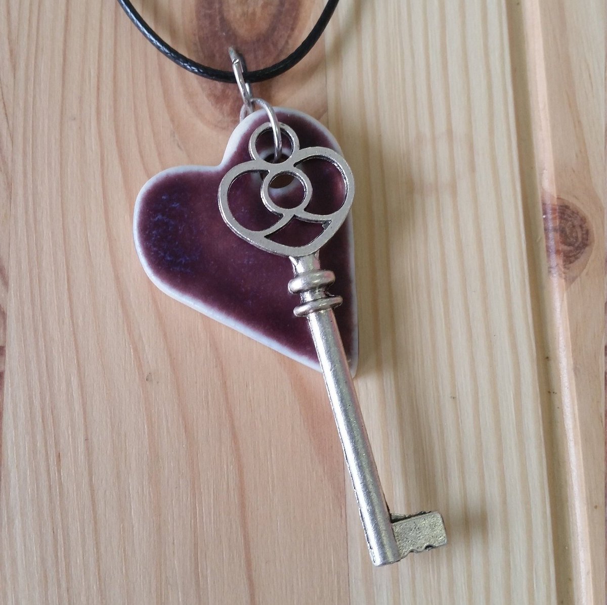 Simply beautiful heart pendant necklace. Each is OOAK and lovingly handcrafted in the Mud Bakery. Strawberry pink and Grape purple pendants available, and optional key charm to give it that extra bit of shine for your Valentine. #etsy #buyhandmade #ceramicjewelry