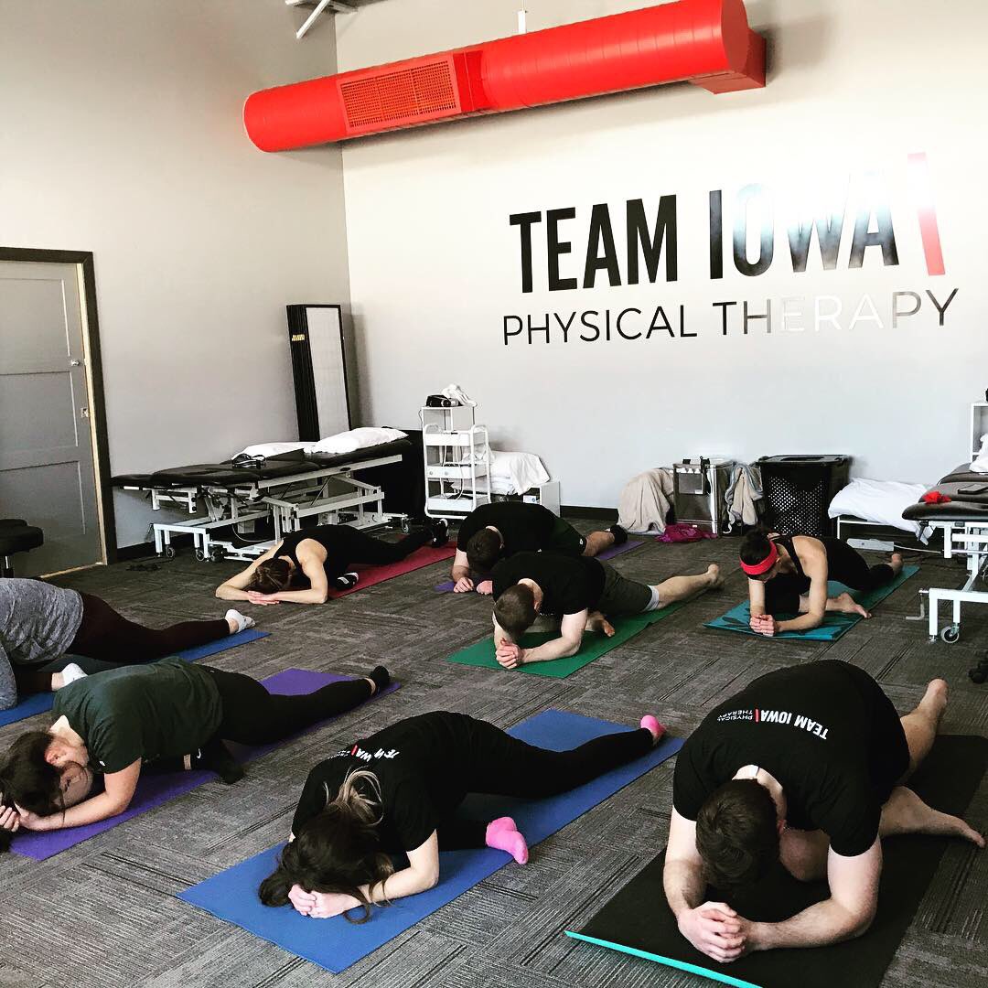 Savanah_Schott's tweet photo. Had a great time teaching @TeamIowaPT #yoga over the lunch hour! #partneryoga #balance #teamwork https://t.co/YrJYfVnmPY