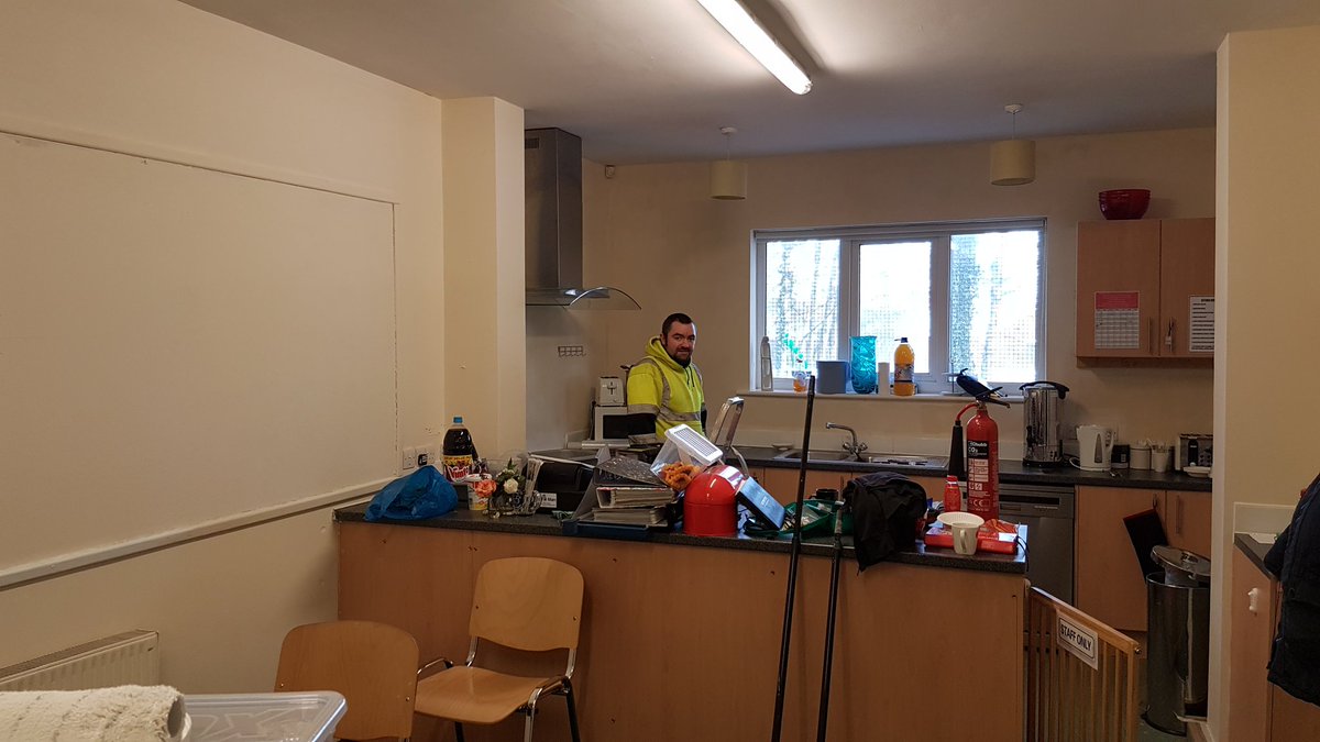 Wigan Veterans from the VETS back to work scheme painting the Community Centre.