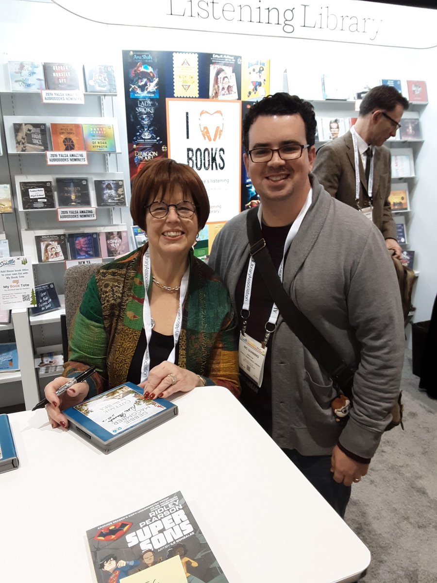 AlltheBooksShow's tweet photo. Here's Nic with @debbiemacomber and Eric getting copy of "Under the Moon: A Catwoman Tale" signed by the author, @LaurenMyracle! #ALAMW2019 #Catwoman https://t.co/jKy6uNLkq5