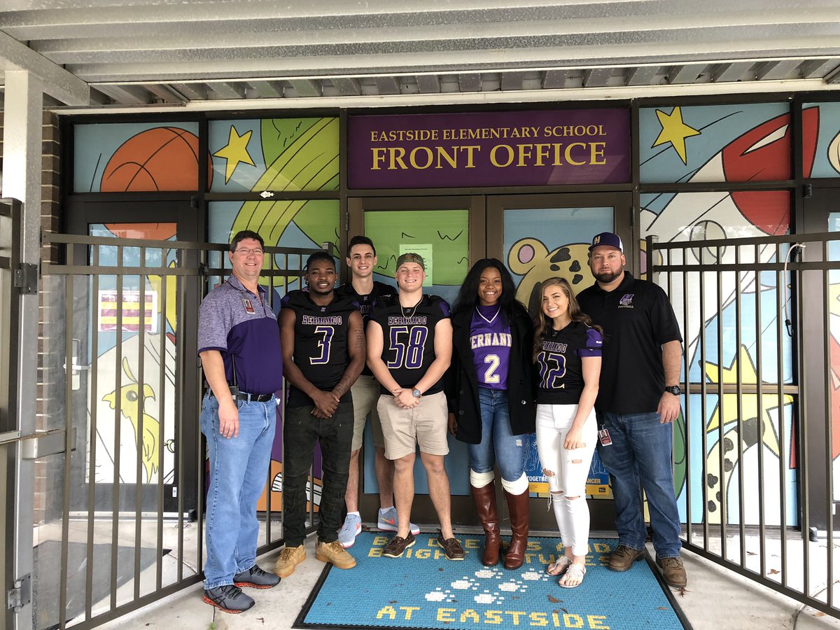 Coach Kaz and Hernando Student/Athletes come to Eastside for Literacy Week to read to Kindergarten and talk to 5th graders