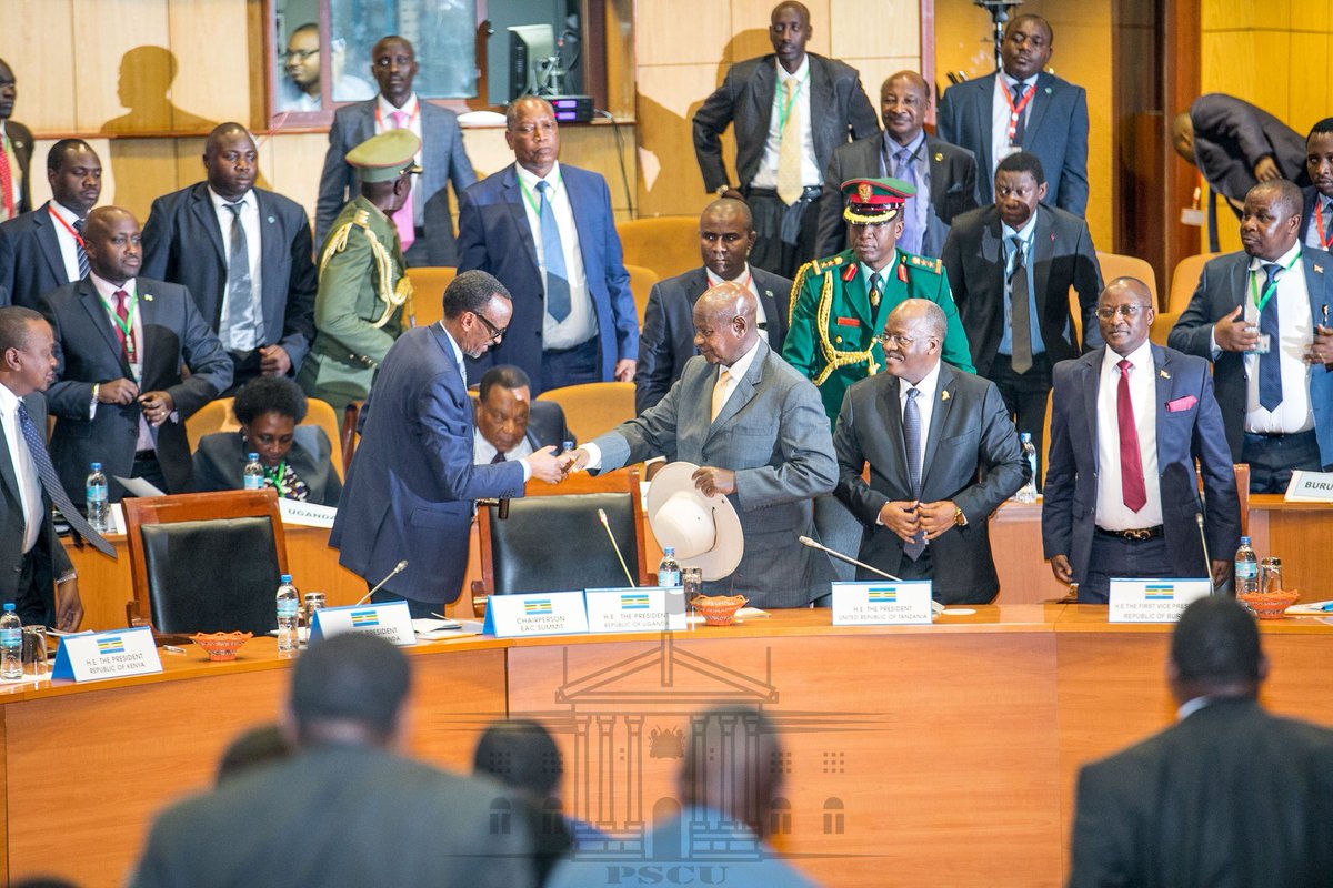 GovUganda's tweet image. Pres. @KagutaMuseveni has today handed over the reigns as Chairperson of the East African Community to his Rwandan counterpart @PaulKagame at the 20th ordinary summit of the @jumuiya Heads of State in Arusha, Tanzania.  #EACSummit #Jumuiya