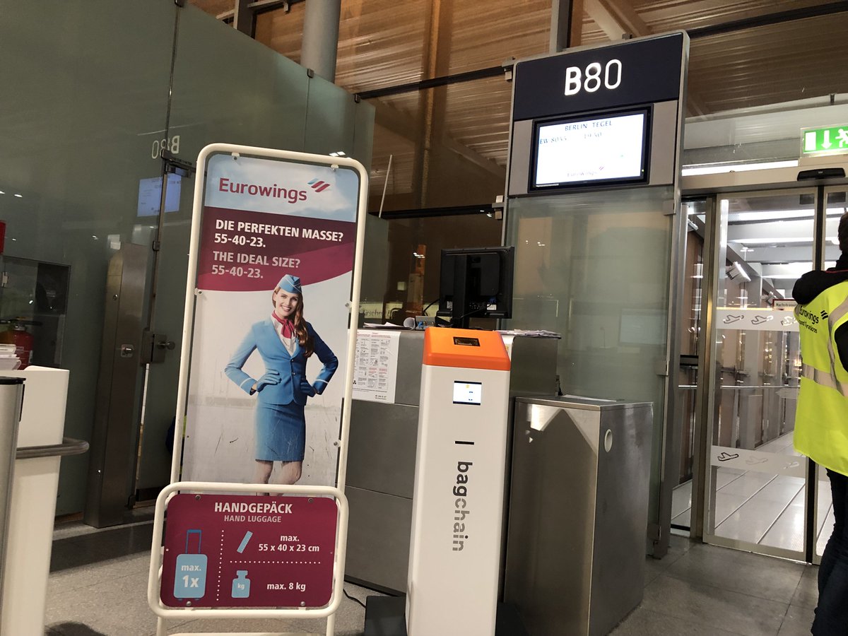 Check-in hand luggage at the gate with Eurowings. We are proud to be part of the Eurowings boarding improvement study &amp; trials. Our mobile bagchain gate kiosk assist in this boarding process improvement. Professional, fast and convenient labelling of hand luggage at the gate.