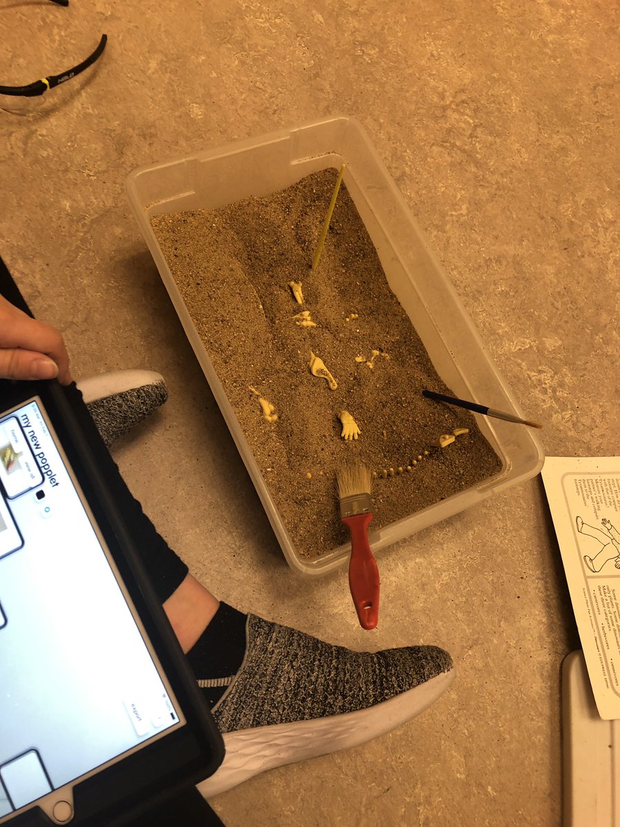 alangfor01's tweet image. Hands on learning with a fossil dig in honour of Alberta’s fossil history. Students record info on Popplet, take video and pictures, dig, assemble, VR, Merge Cube, Epic Books, AR, examining real fossils #engaged #AugmentedReality #MergeCube