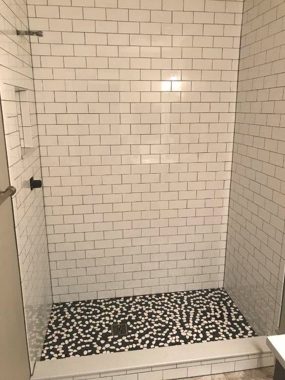 ceramictec's tweet photo. Completed the Brandon, Florida tub to stand-up shower conversion. Tile is 3x6 Jeffrey Court white subway (shower walls) and Bati Orient "Black & White" Reconstituted flat pebble (shower floor) #tile #3x6 #subway #shower #tubconversion #jeffreycourt #flatpebble #brandon https://t.co/WtlAw41Lhw
