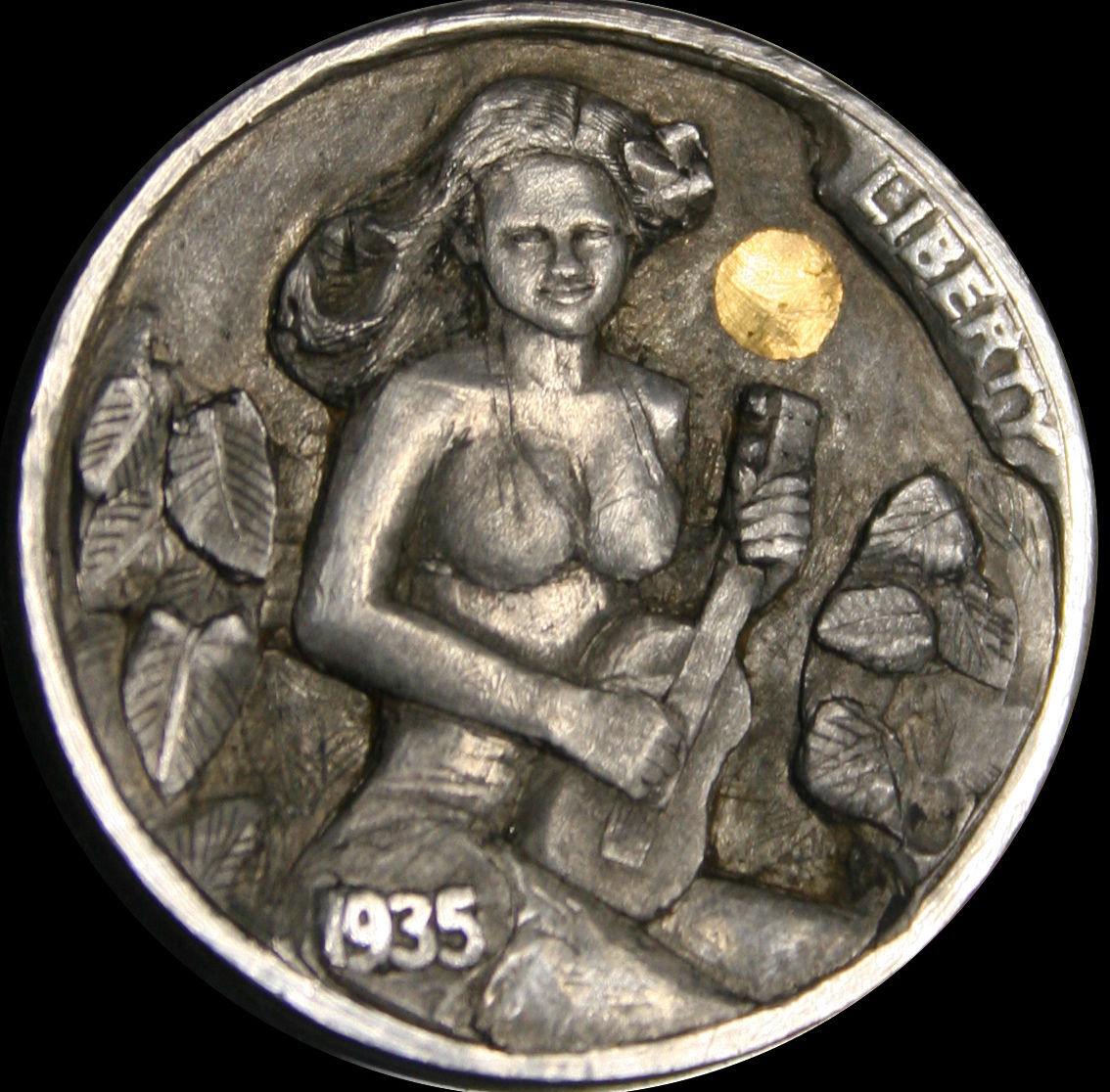Hobo_Nickel_Soc's tweet photo. 2/2/2019 = #WorldPlayYourUkuleleDay #UkuleleDay #HoboNickel #CoinCarving by #DanFarrell https://t.co/IYzGrKMj8H