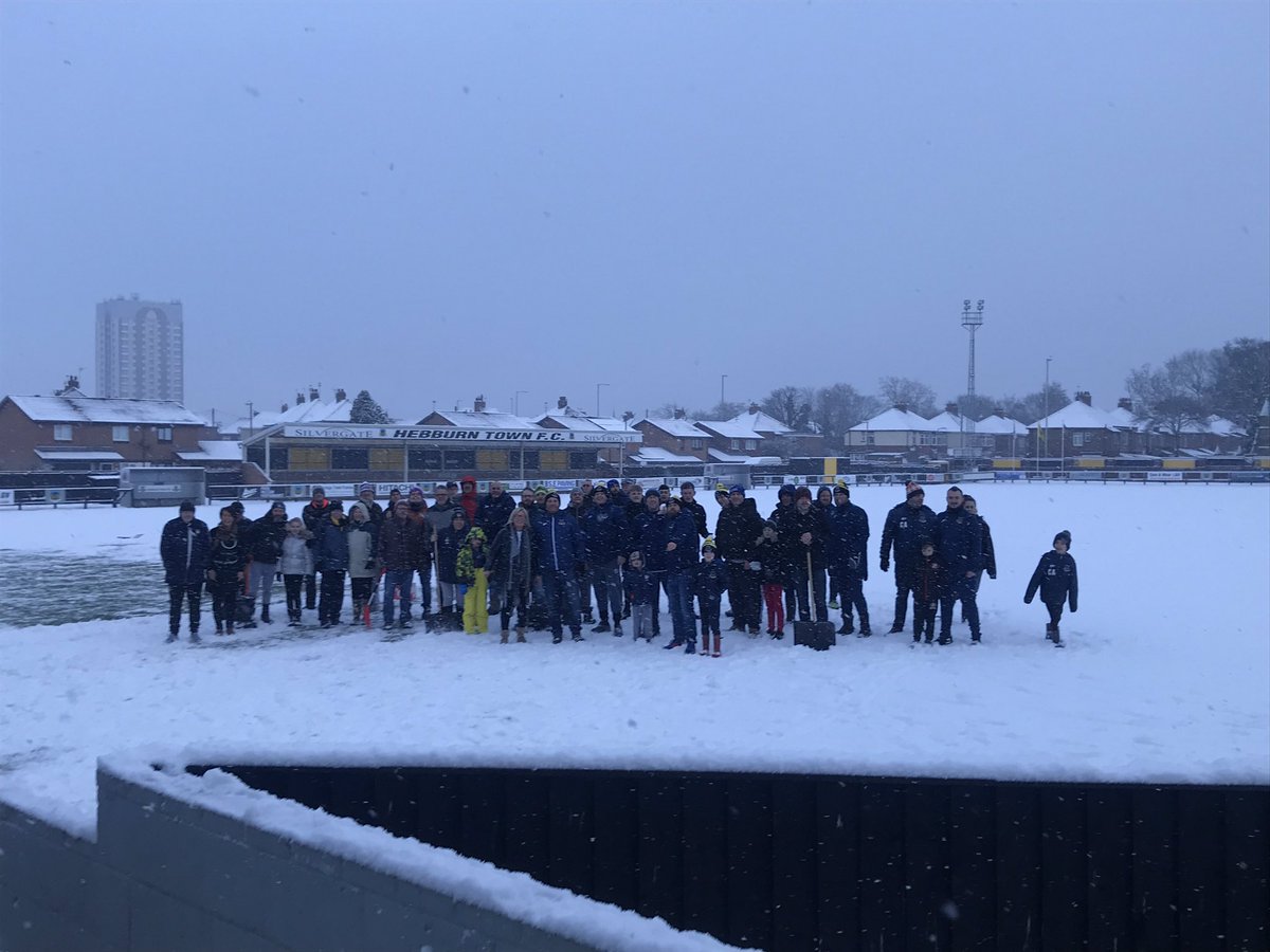 HebburnTown's tweet photo. HUGE thanks to all volunteers who turned up earlier this morning to help clear the snow, we were on a roll. Great to see @SouthShieldsFC fans supporting as well #topnotch #nonleaguefamily #weallhatesnow https://t.co/CkObkPs01L